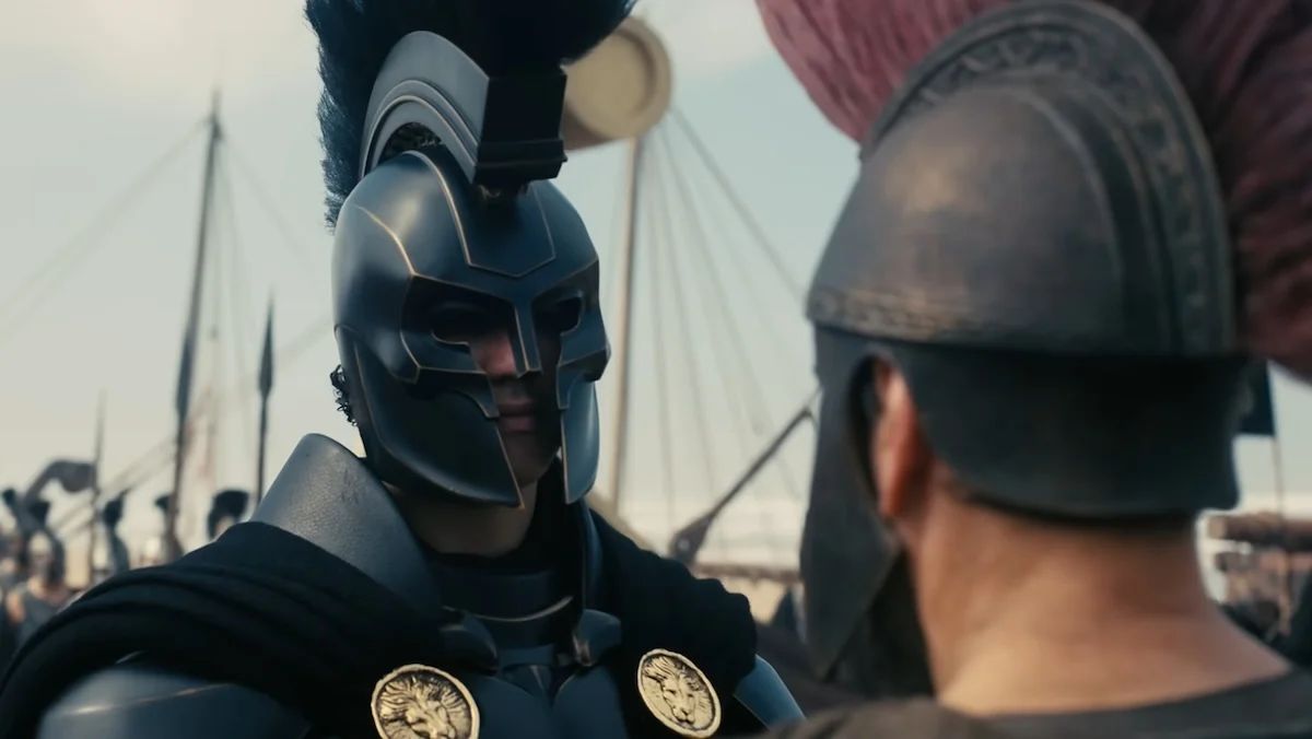 Agamemnon in his full armor speaks to Odysseus in The Odyssey