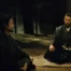 Prisoner Kanbei (Masaki Suda) sits with Lord Murashige (Masahiro Motoki) in The Samurai and the Prisoner.