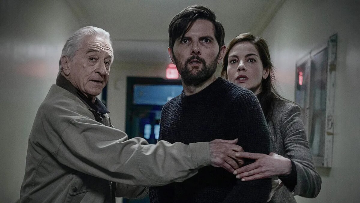 (L-R) Robert De Niro as Peter Willis, Adam Scott as Tom Kennedy and Michelle Monaghan as Amanda Beck in The Whisper Man.