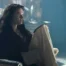 Gayle Rankin as Alys River near a fireplace on House of the Dragon