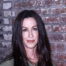 Alanis Morissette says she 'dipped into psychosis' when postpartum