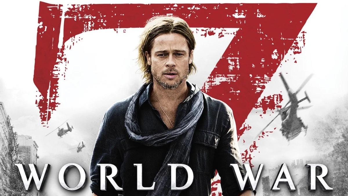 Brad Pitt wit long hair and a big scarf in the poster for World War Z