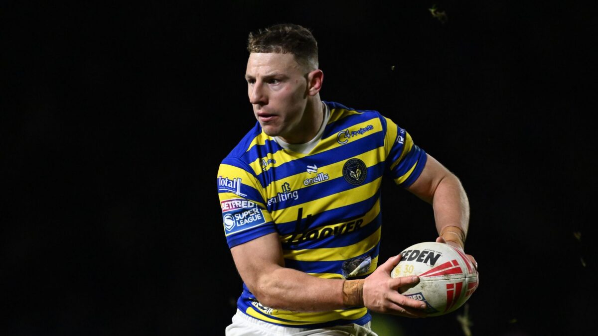 George Williams of Warrington Wolves passing the ball during a 2026 Super League match.