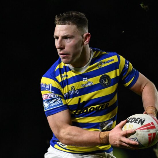 George Williams of Warrington Wolves passing the ball during a 2026 Super League match.