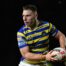 George Williams of Warrington Wolves passing the ball during a 2026 Super League match.