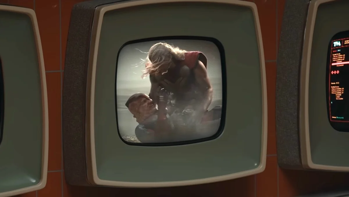 Thor holds an injured Deadpool on a TVA monitor in Deadpool & Wolverine