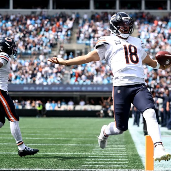 Caleb Williams #18 of the Chicago Bears celebrates after scoring a touchdown during the first quarter against the Carolina Panthers of the game at Bank of America Stadium on Sept. 13, 2026 in Charlotte, North Carolina.