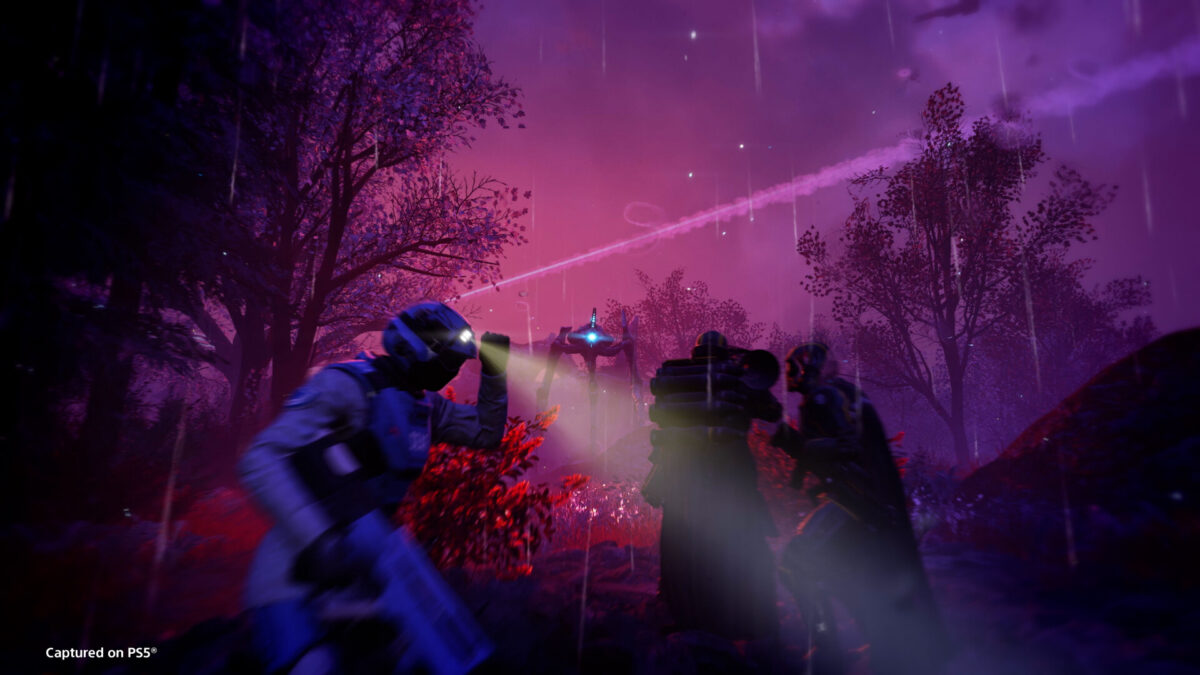 Helldivers 2 soldiers fighting bugs in an official Steam screenshot from Arrowhead Game Studios