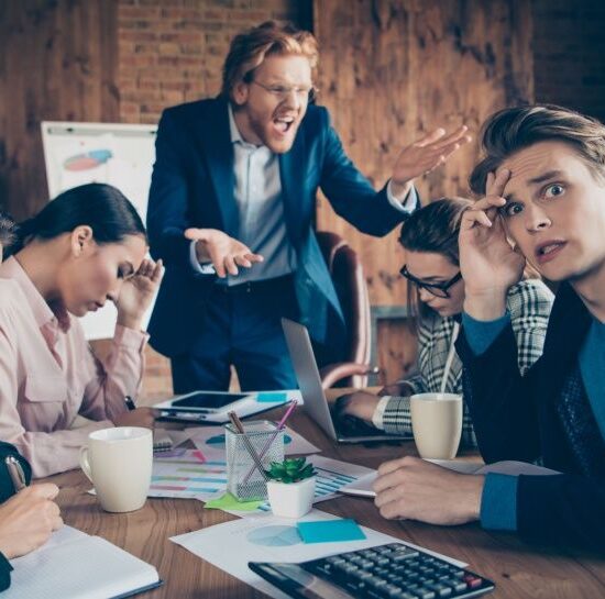 Close up photo business people he him his she her partners working office together mad raged chief angry anger yelling about losing big money dressed suits formal wear mistakes noting every word