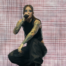 Young Miko performing at Intuit Dome in Los Angeles.